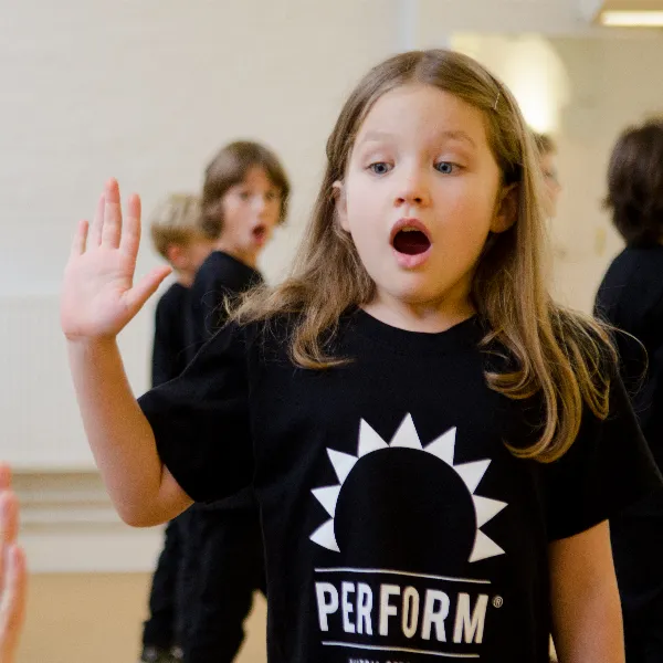 Child acting in drama class